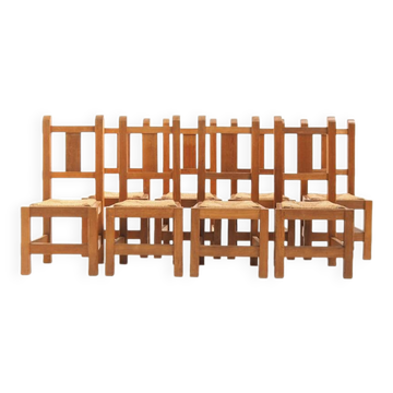 Ensemble de huit chaises en chêne massif faites à la main, années 1970.