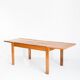 Extendable table and 4 chairs set with a rationalist design in solid elm wood. France, 70's
