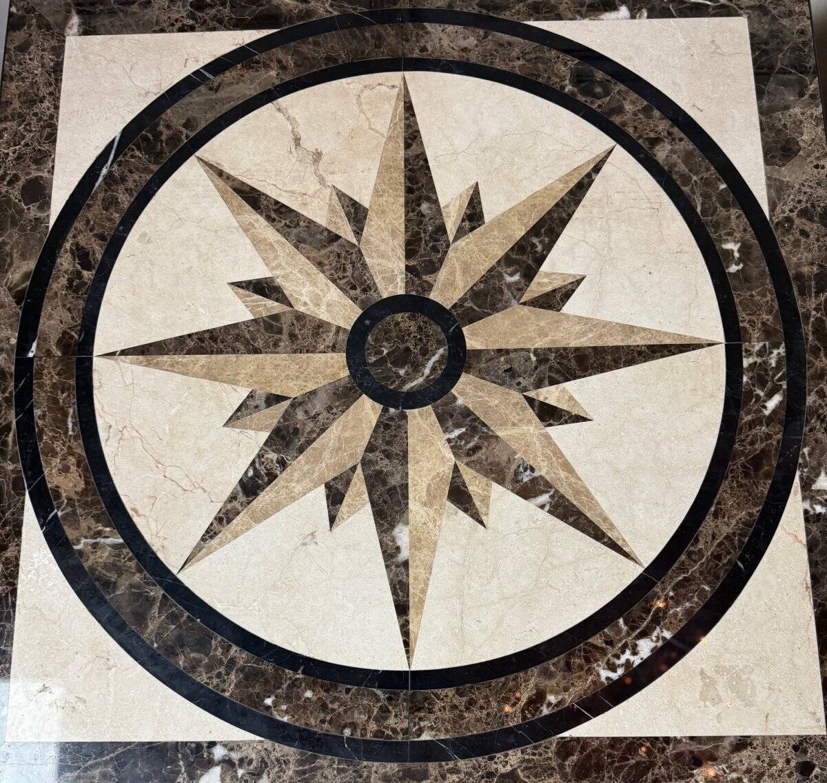 Pair of marble and metal tables, marble marquetry compass rose, circa 1990