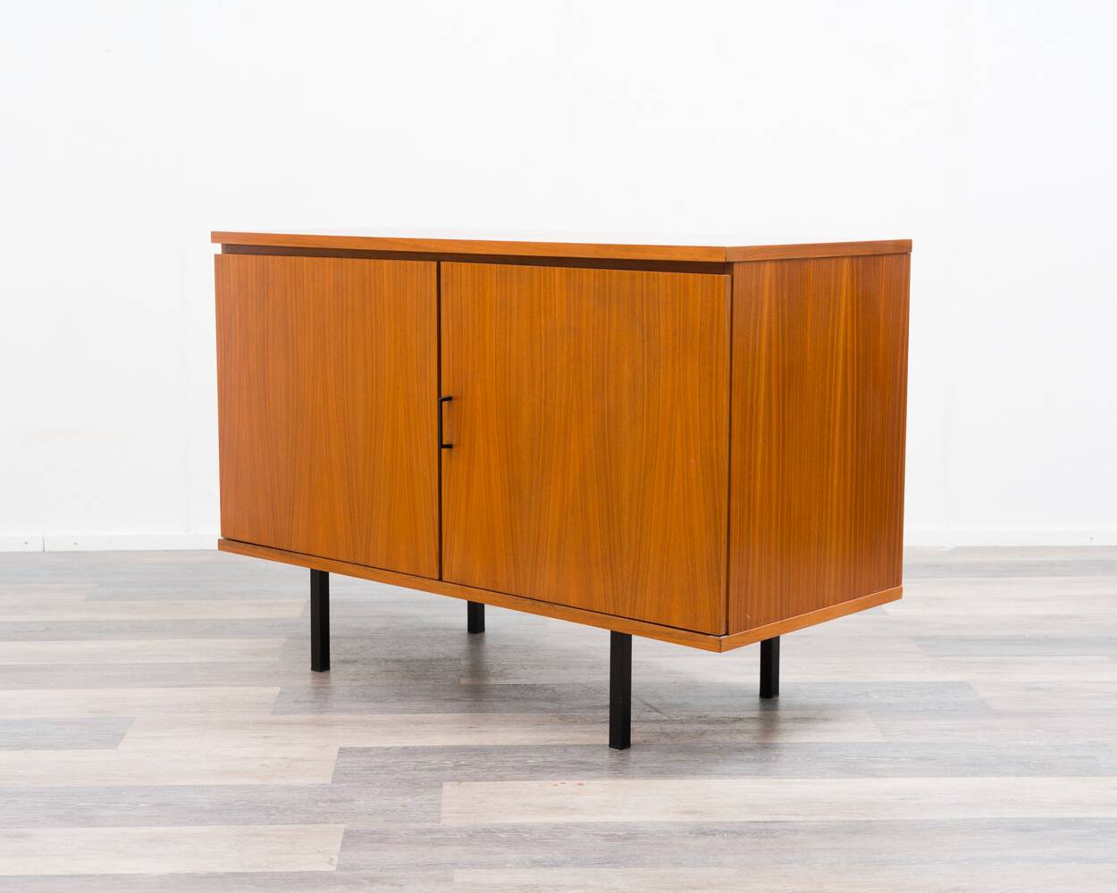 1960s walnut two-door cabinet.
