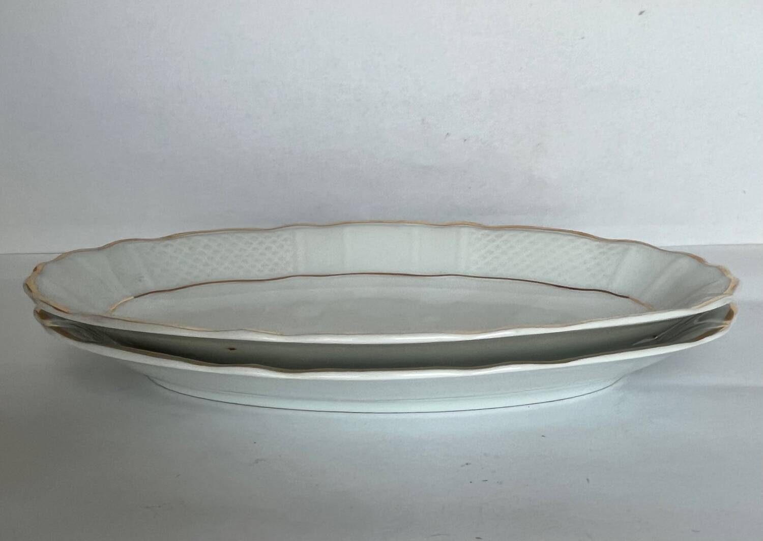 2 white porcelain ramekins