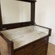 Antique wooden and marble dressing table from the early 20th century.