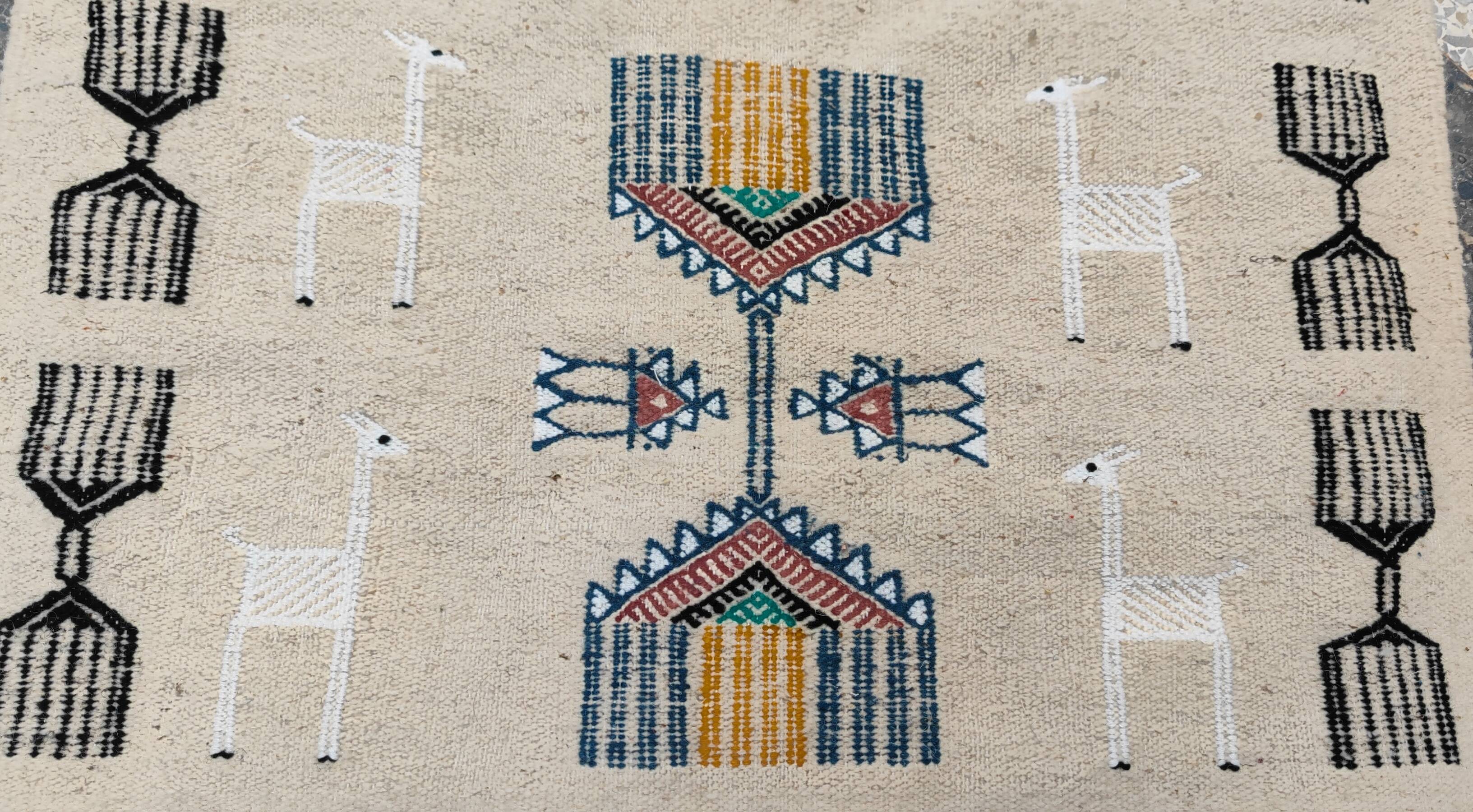 Handwoven kilim rug in natural wool
