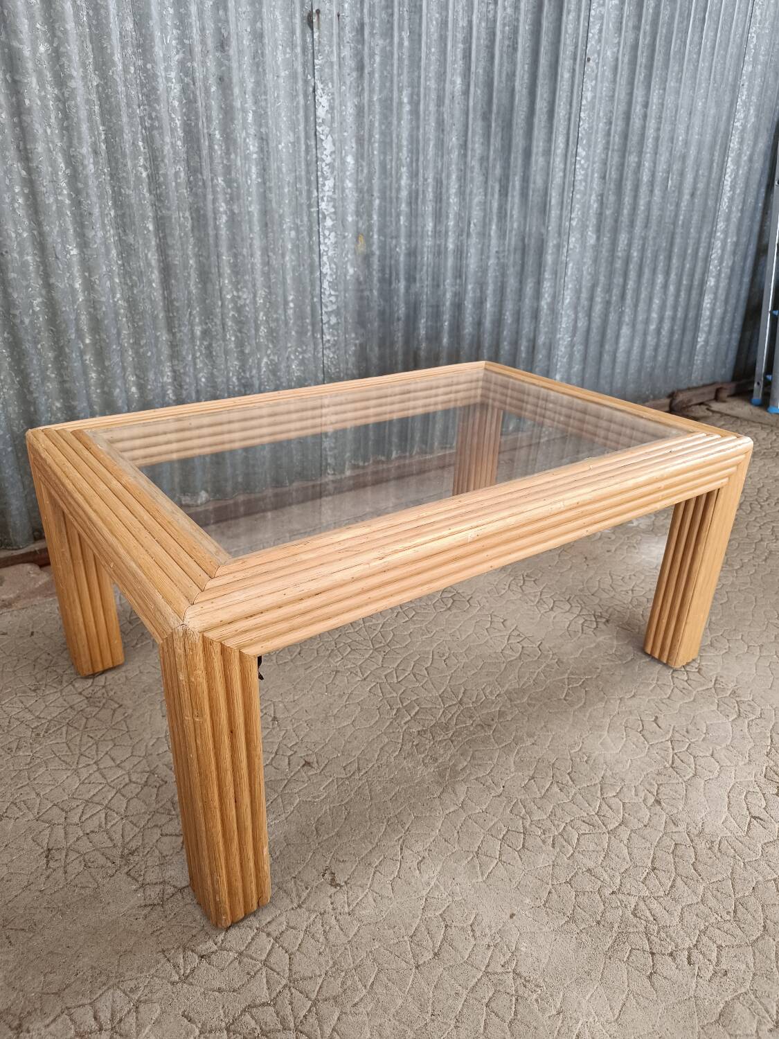 Glass coffee table in rattan/bamboo