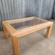 Glass coffee table in rattan/bamboo