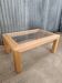 Glass coffee table in rattan/bamboo