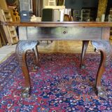 Nineteenth round table in carved mahogany with extension Ø 133 cm