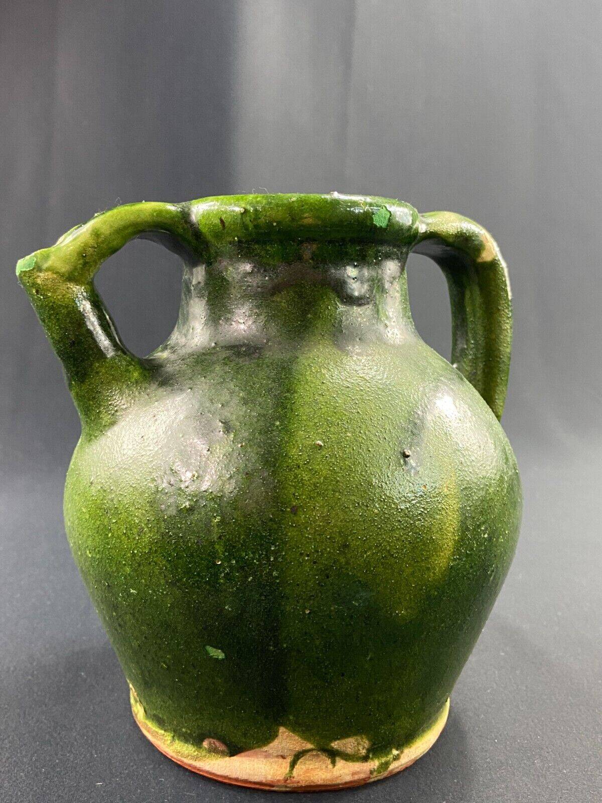 19th century green enamelled stoneware jug