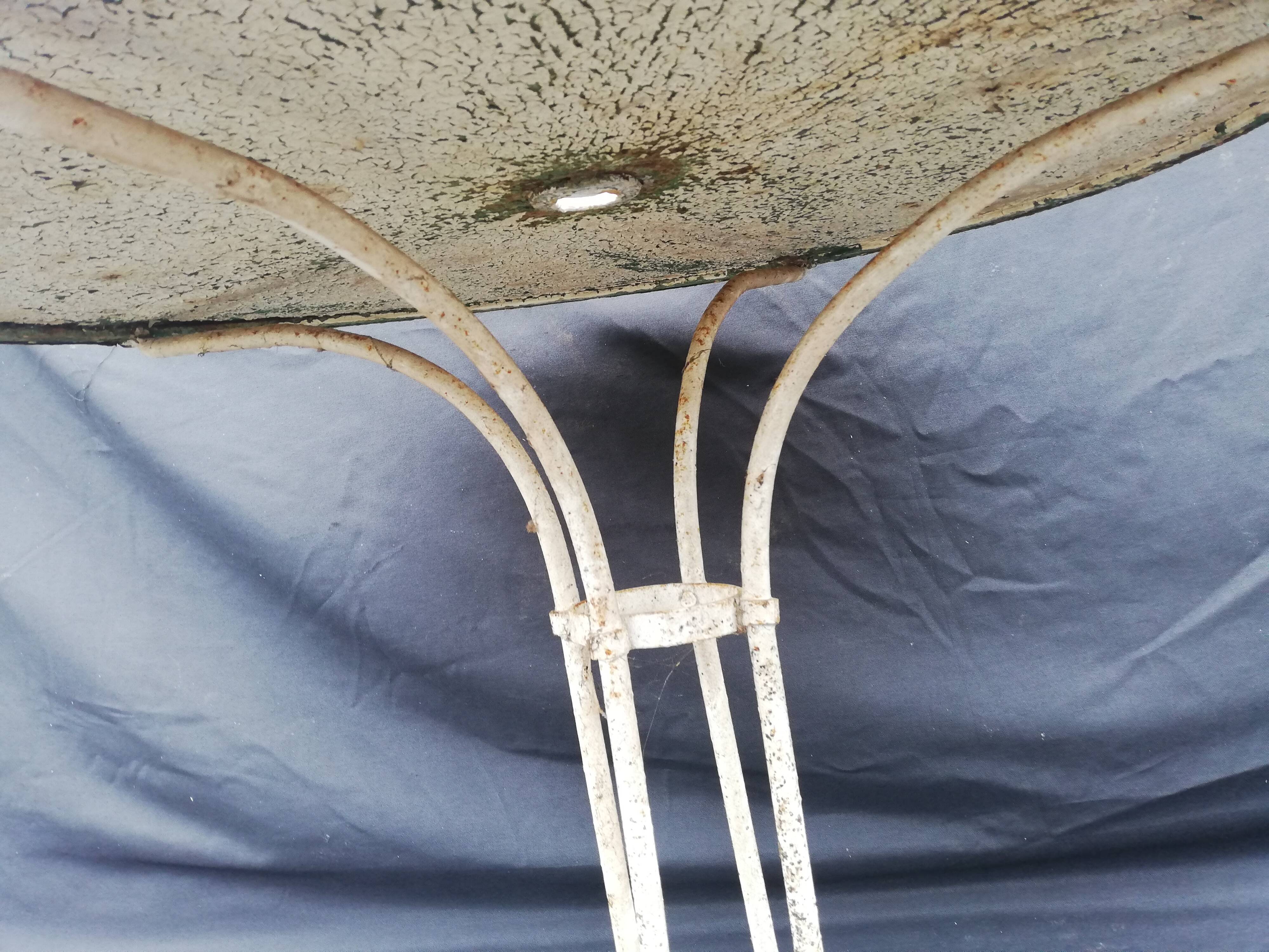 Old wrought iron garden table