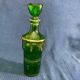 Bouteille en verre vert et dorure style Louis