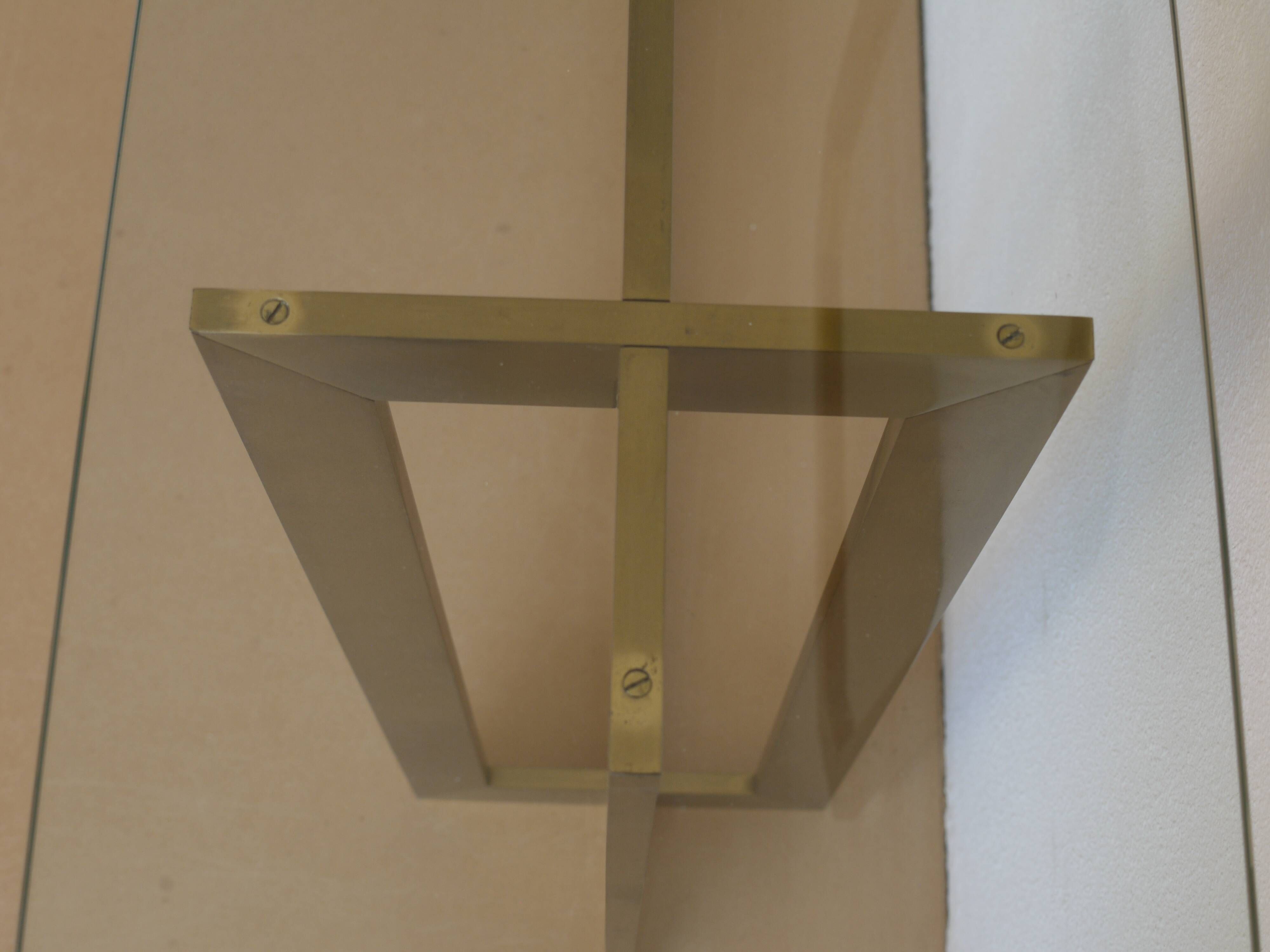 Modernist brass and glass console table & mirror. 1970s