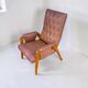 Vintage armchair in light brown faux leather, 1960s.