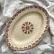 Oval ironstone dish with brown geometric decoration KG Lunéville