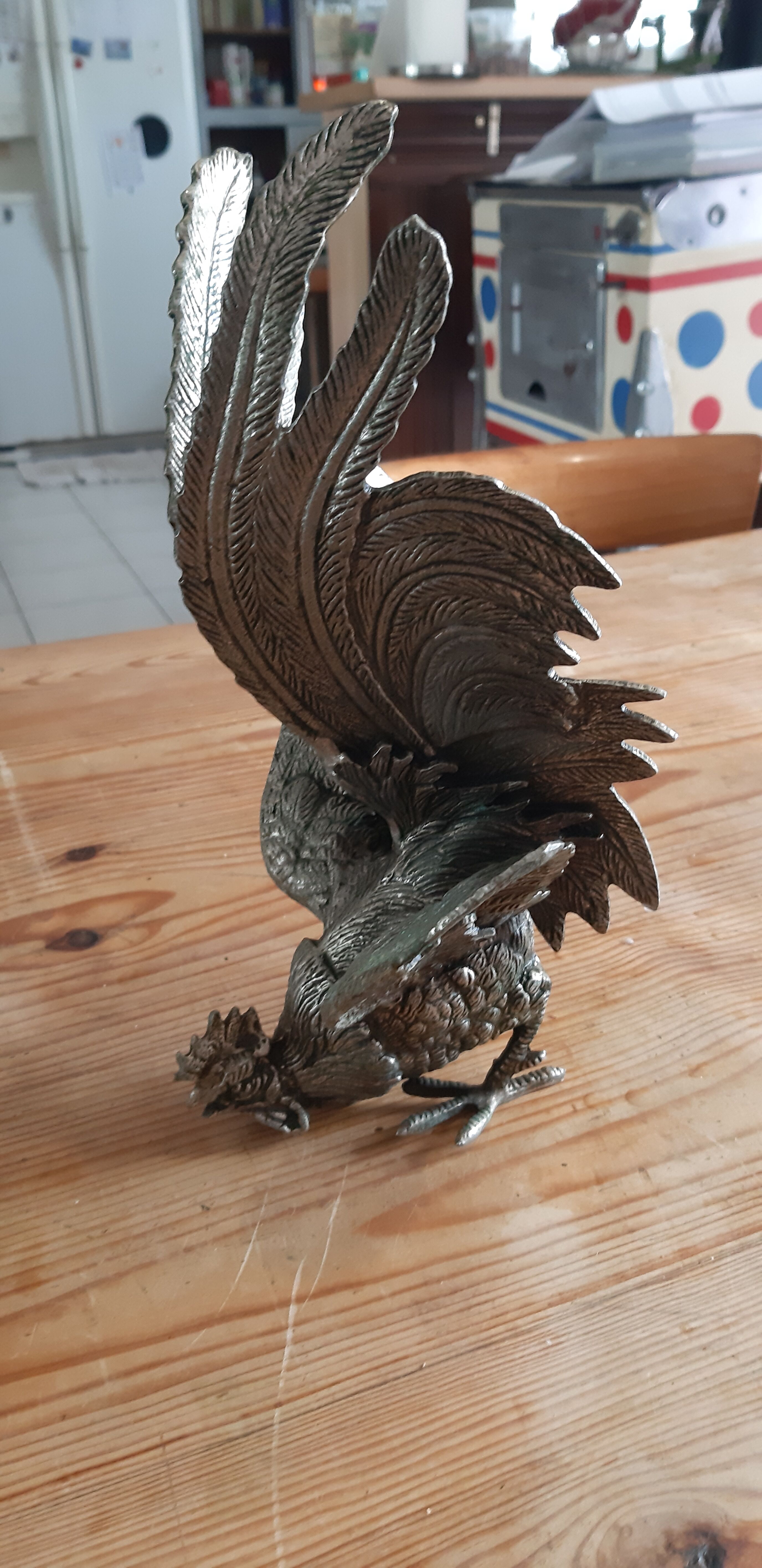 2 silver metal roosters