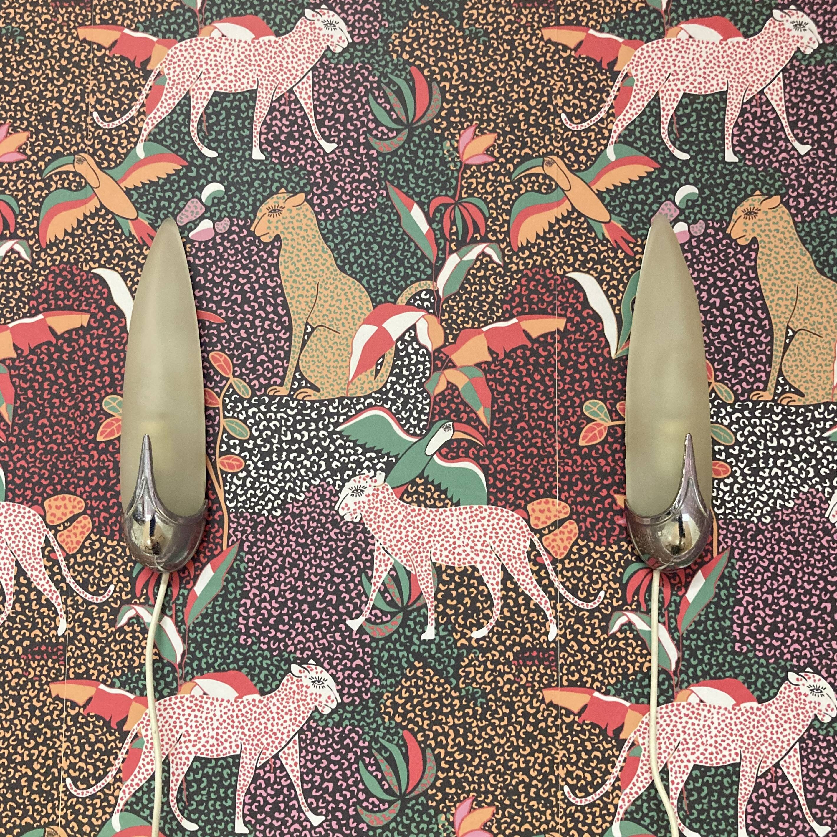 Pair of 1950s designer glass wall lights.