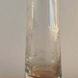 Crystal vase with acid-etched patterns.