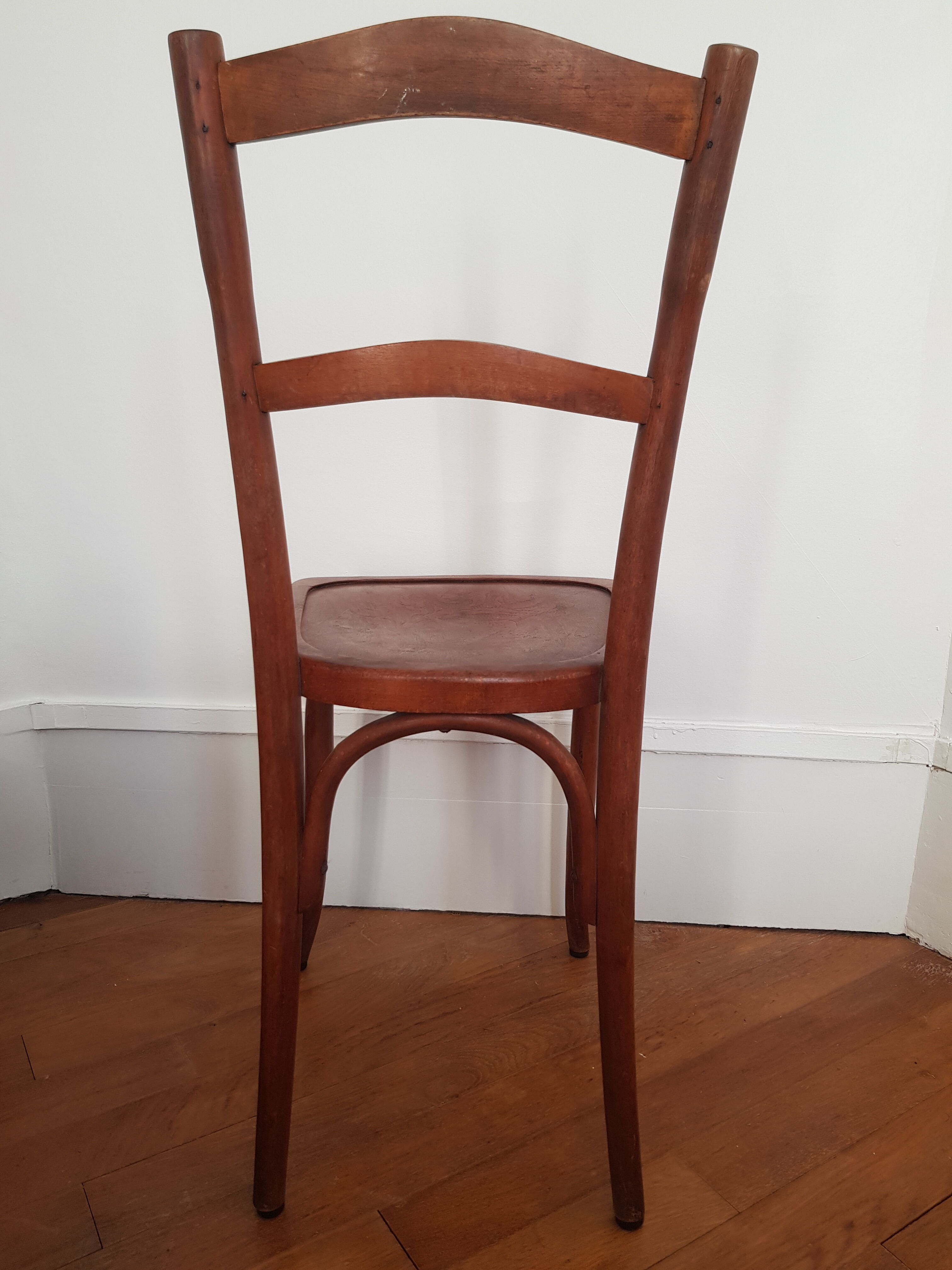 Curved wooden bistro chair