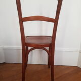 Curved wooden bistro chair