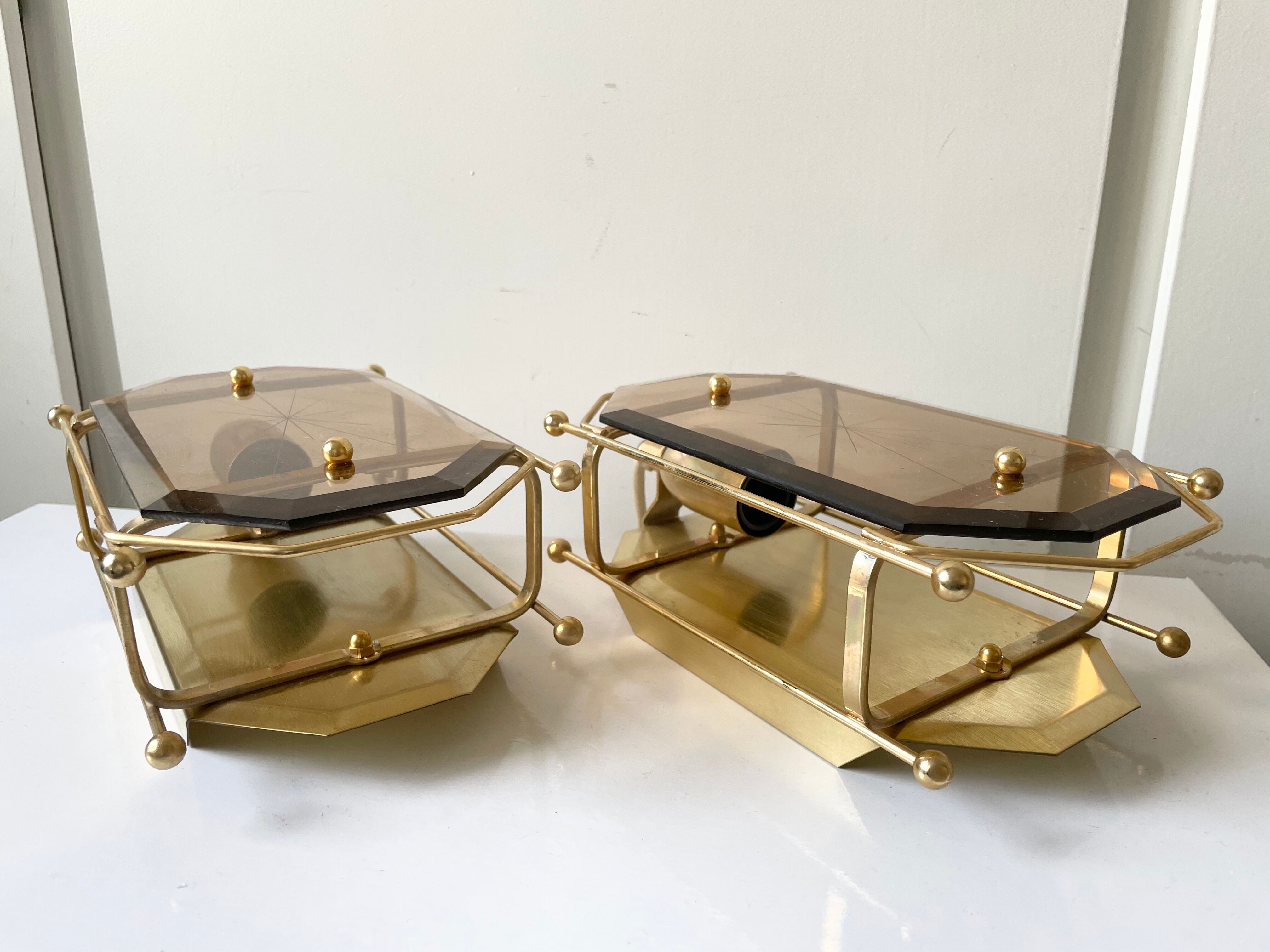 Pair of Scandinavian Vintage  wall light Sconce in Brass & Amber colored Glass