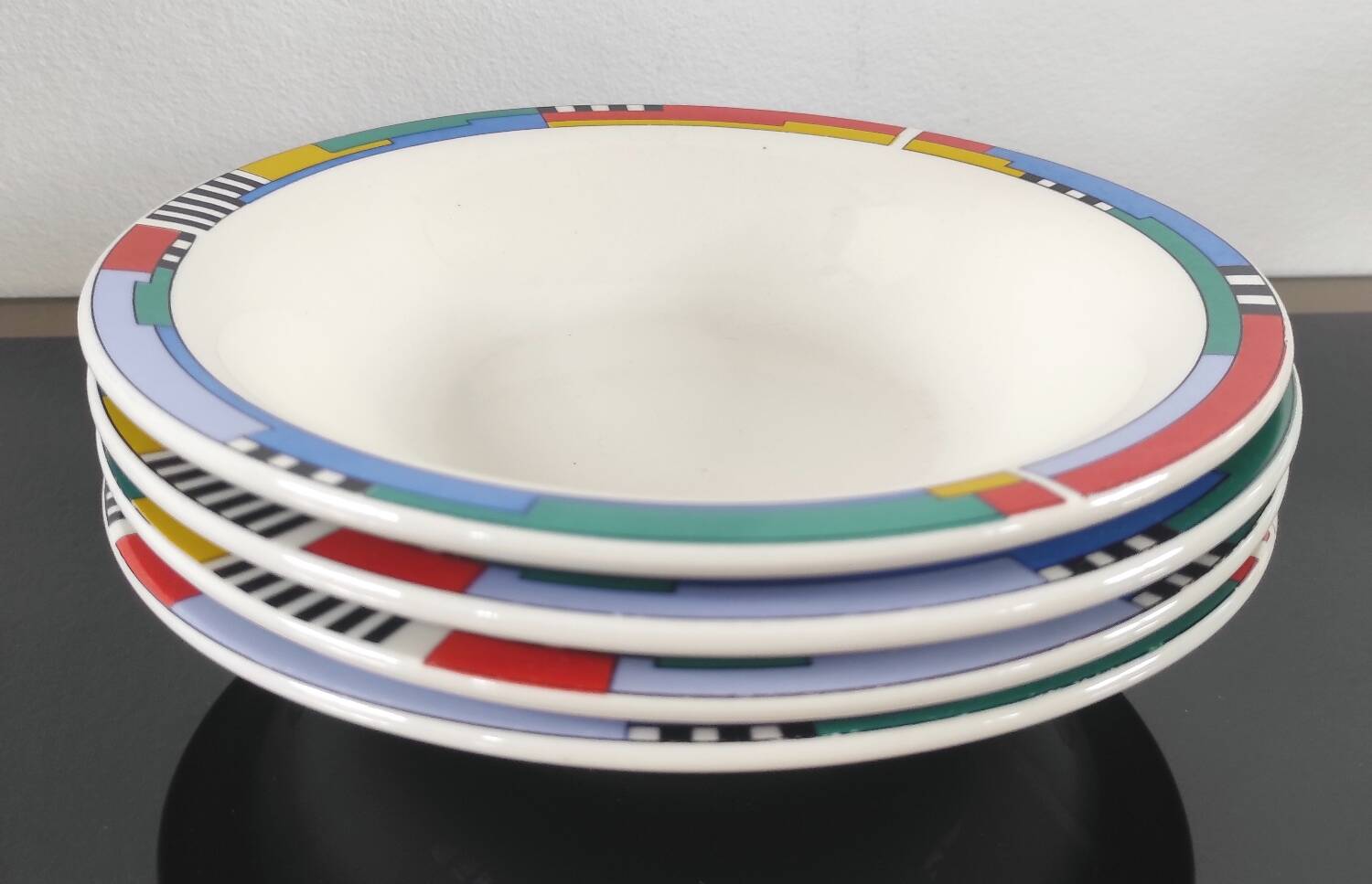Set of 4 vintage Memphis style deep plates.