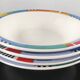 Set of 4 vintage Memphis style deep plates.
