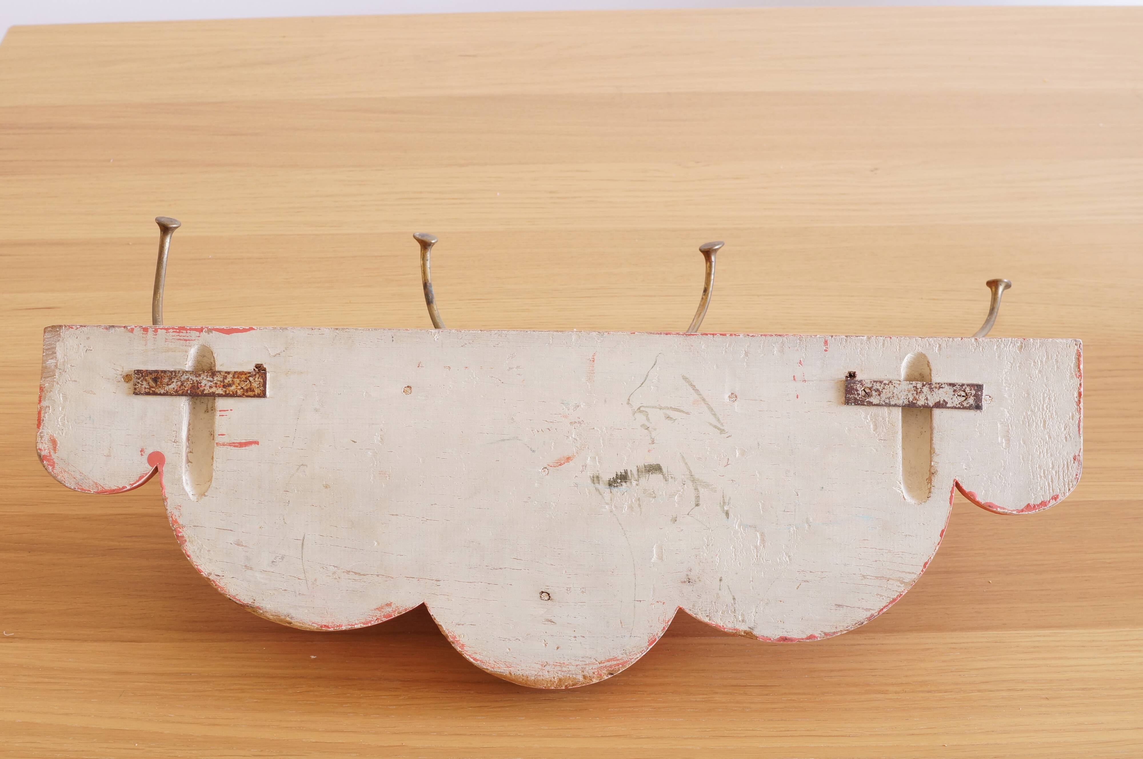 Coat rack in painted wood and vintage brass
