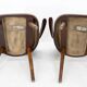 Pair of curved wooden shell armchairs in the style of Oswald Haerdtl.