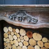 Patinated wooden fireplace