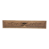 Natural wood pediment with bunches of grapes