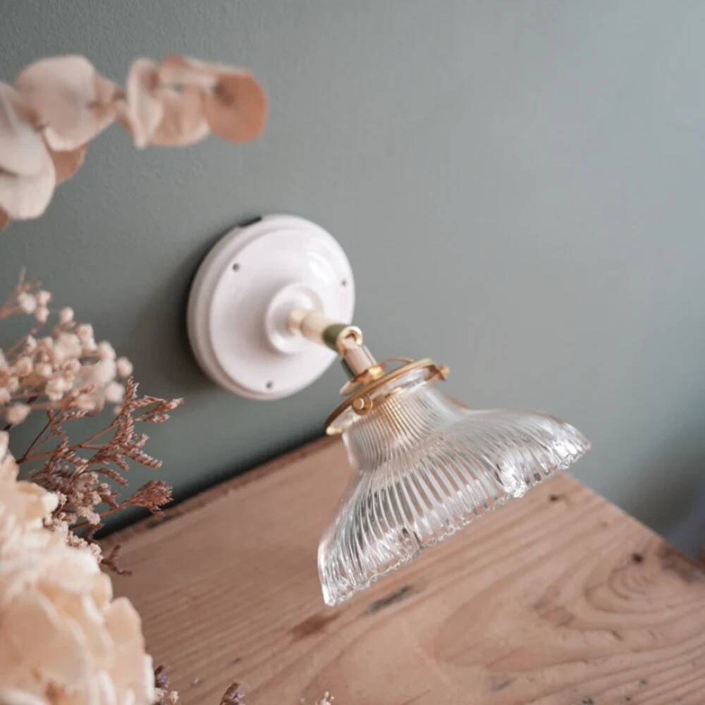 Porcelain and holophane wall light