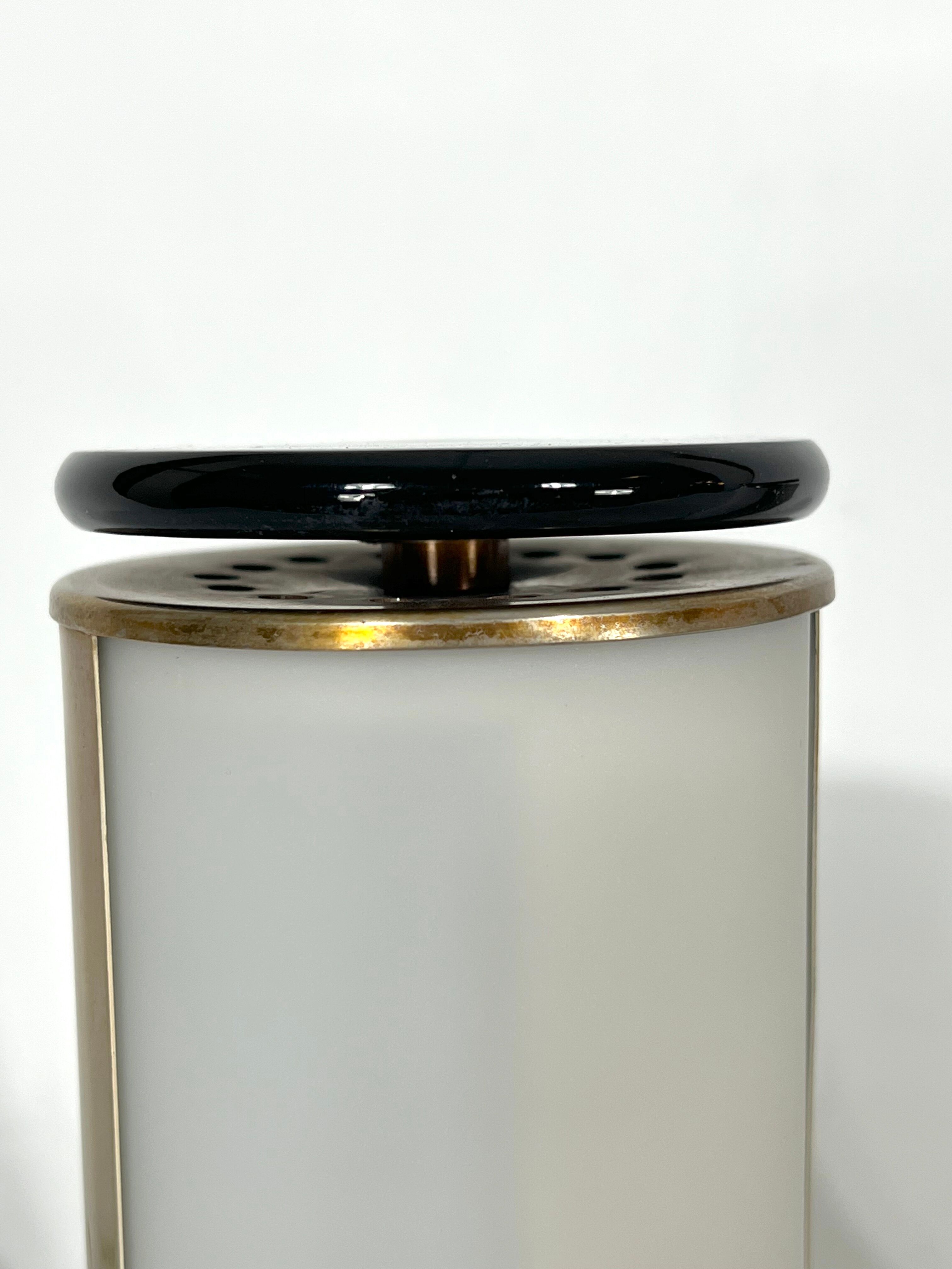 Mid-century modern pair of rare labeled Lumi Milano table lamps