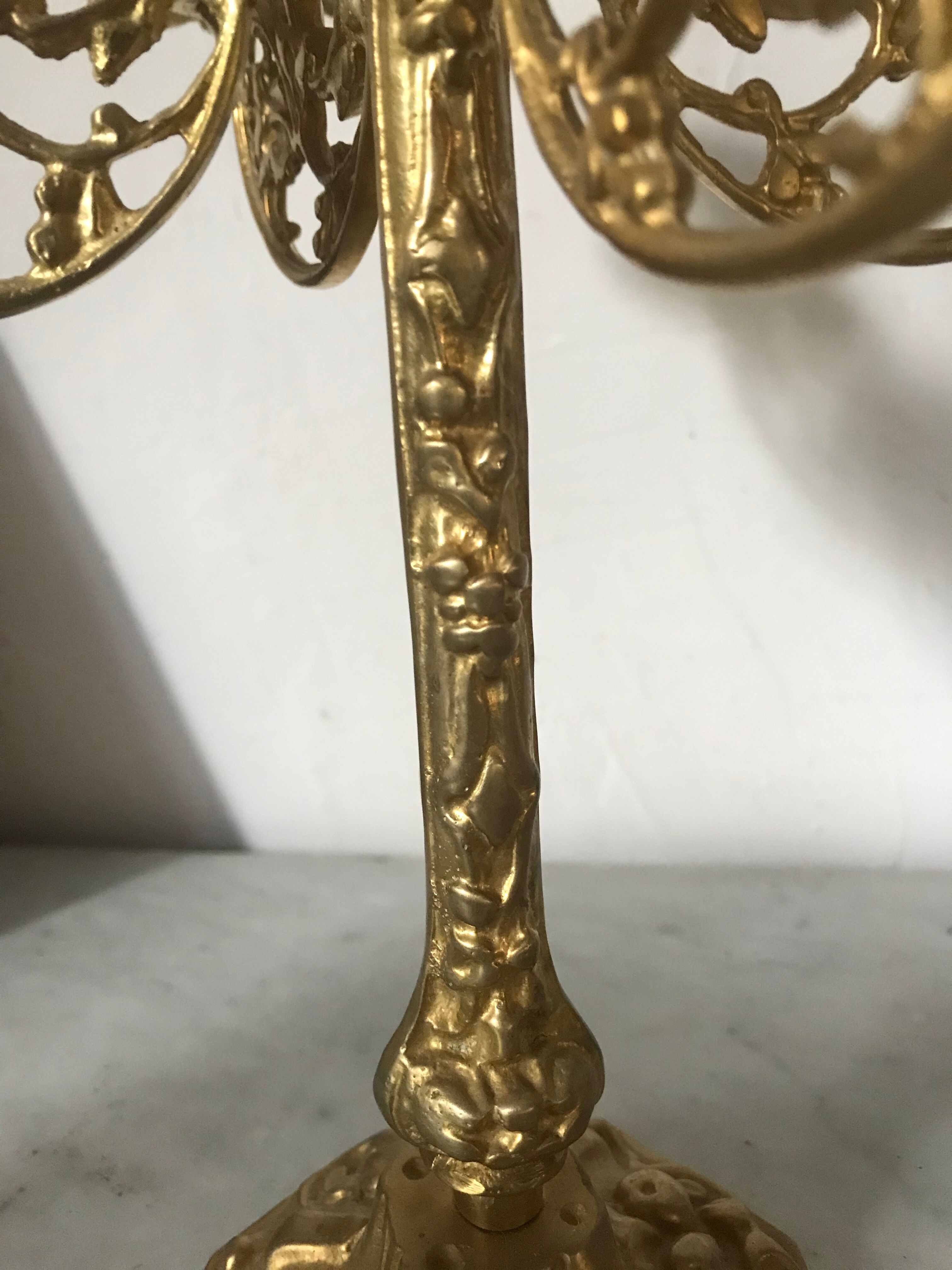 Pair of golden brass candlesticks