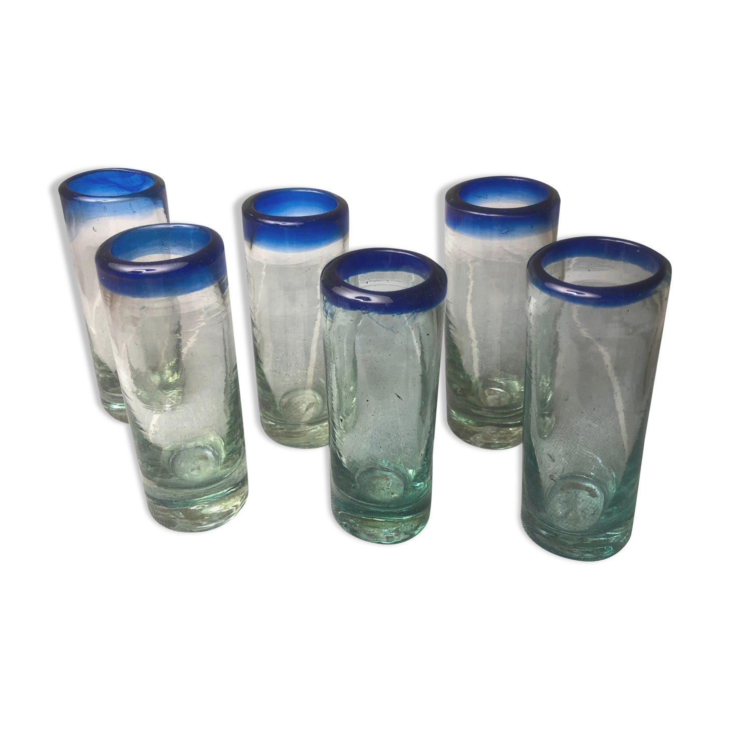 Handmade cobalt blue tequila glasses made of recycled glass