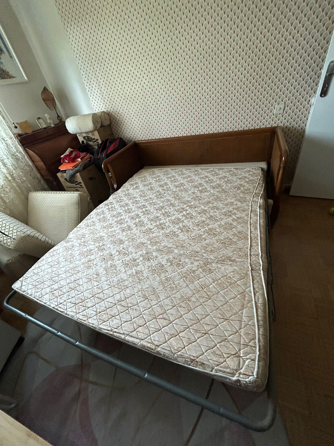 Vintage convertible wooden and cane sofa