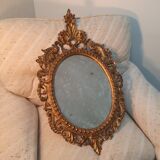 Italian mirror in gilded scupted wood
