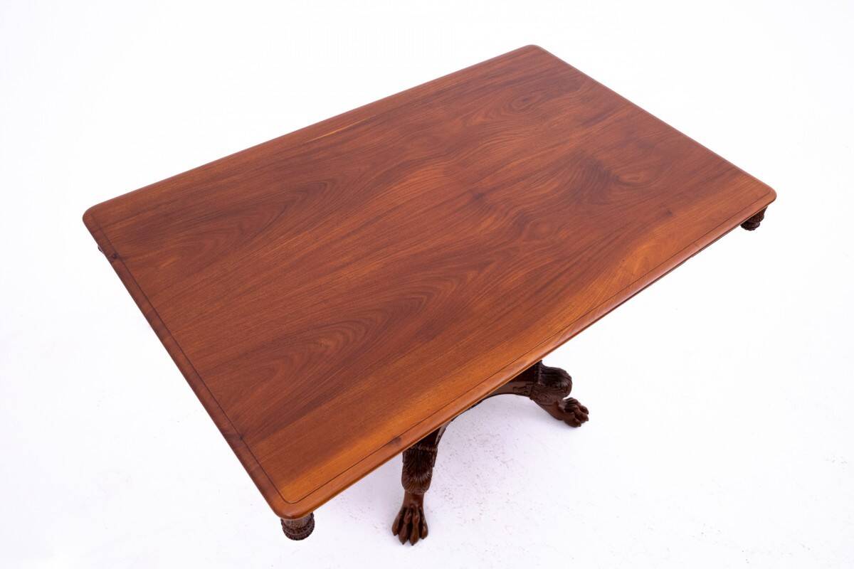 Late 19th century lion's paw table with chairs, Northern Europe.