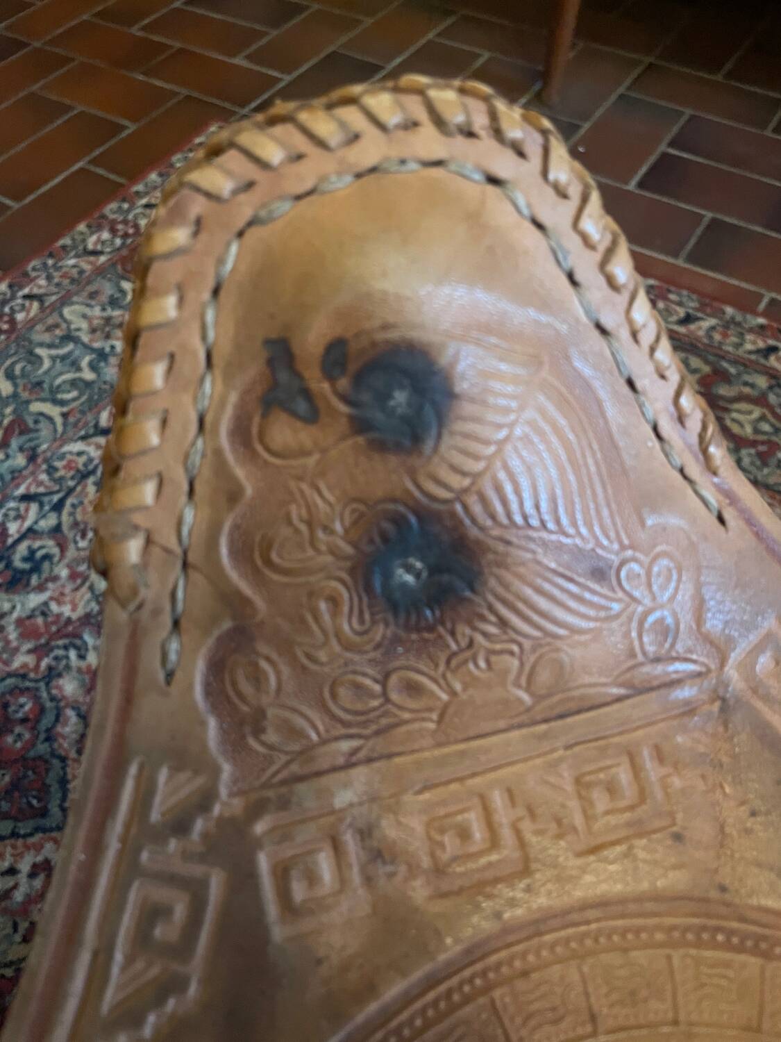 Vintage Mexican tripod stools in bamboo and leather.