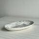 Tidy, small black and white designer dish Salins France.