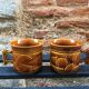 Two brown coffee cups