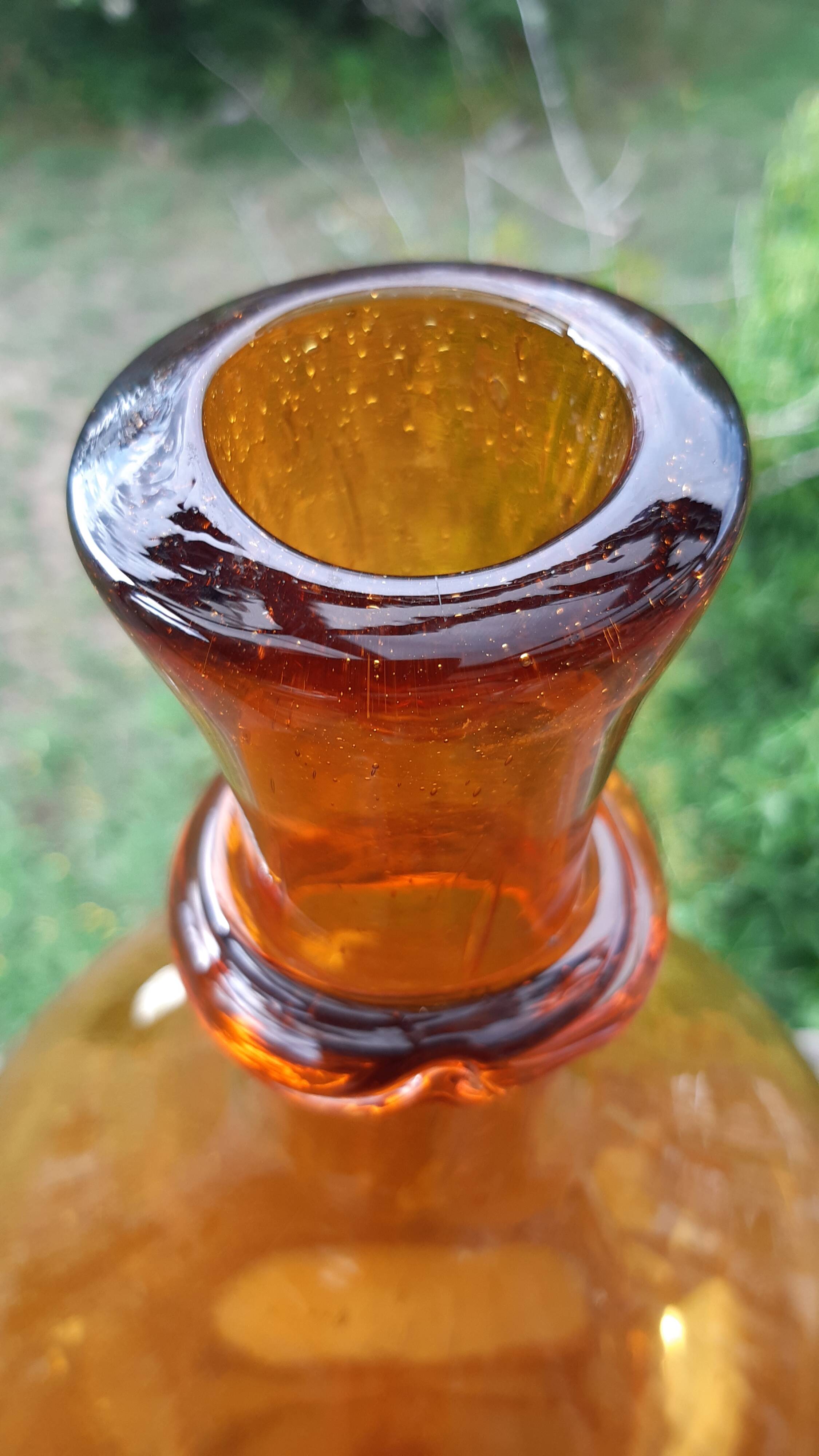 Demijhon or amber blown glass