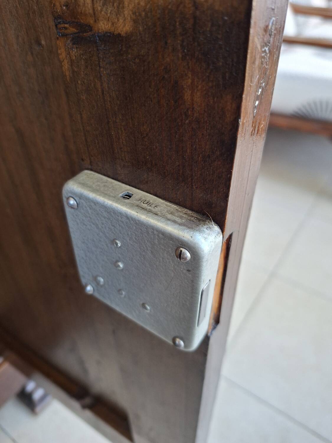 Small storage unit in solid wood and copper.