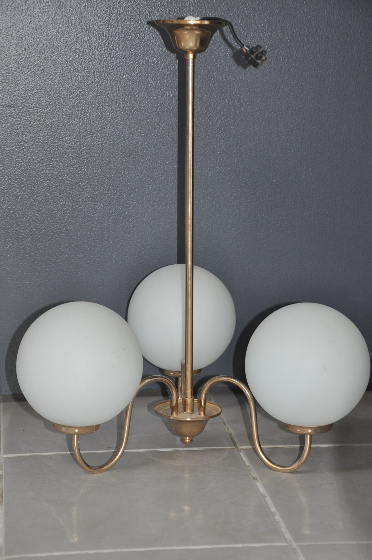 Brass and opaline luster