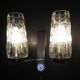 Pair of wall lights from the 1950s-1960s with a push button switch.