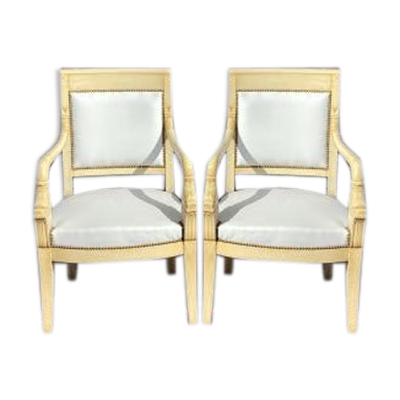 Paire de fauteuils aux dauphins d’époque empire en bois laqué
