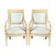 Paire de fauteuils aux dauphins d’époque empire en bois laqué