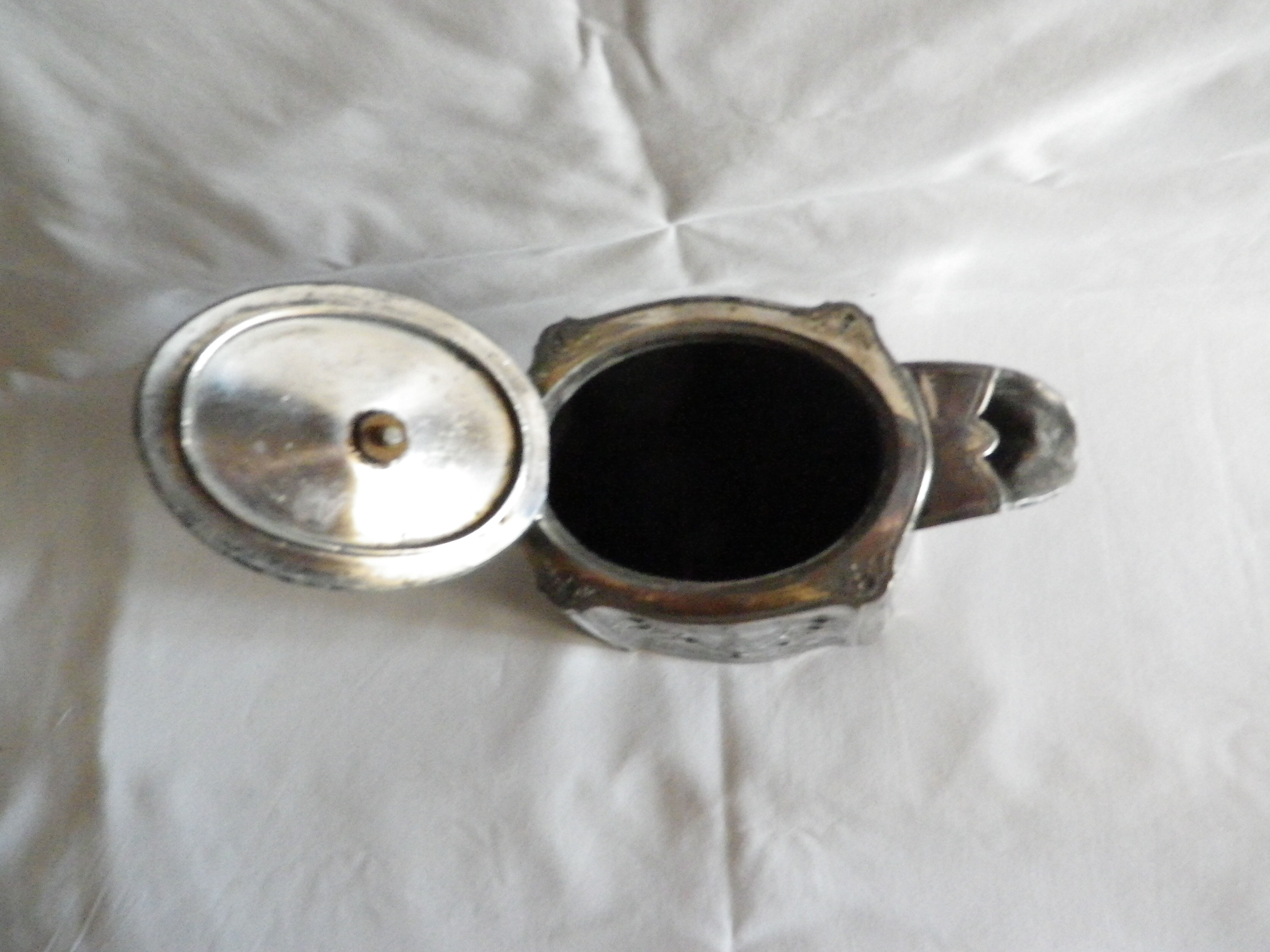 Silver metal coffee pourer