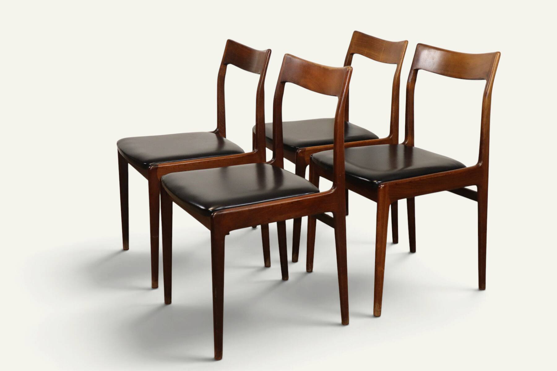 Set of 4 vintage teak and black faux leather chairs – 1960s