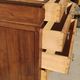 Old chest of drawers with white marble.