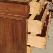 Old chest of drawers with white marble.