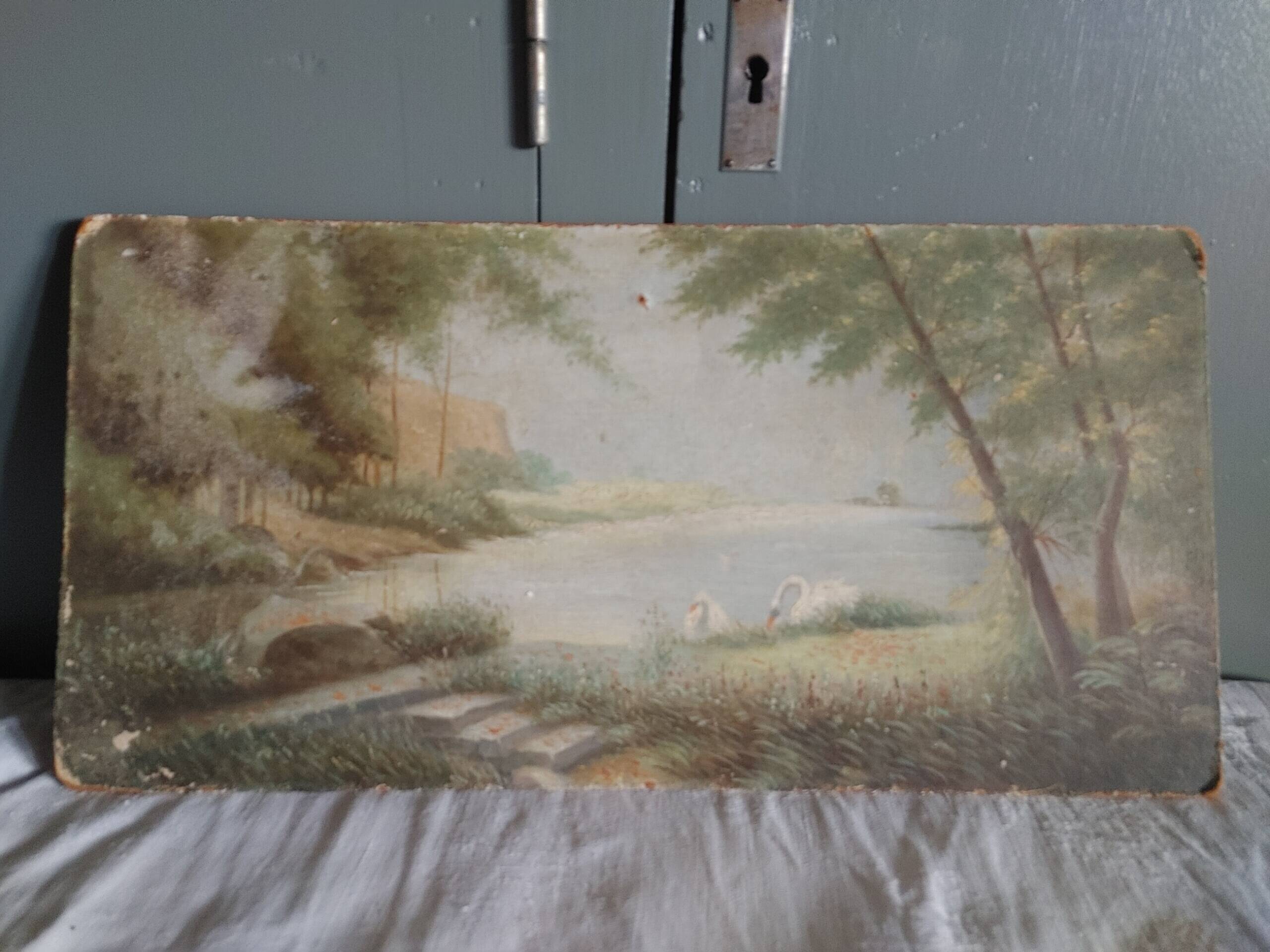 Old oil on rigid cardboard depicting swans on the water